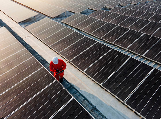 Solar panel system,engineer working on checking and maintenance electrical equipment